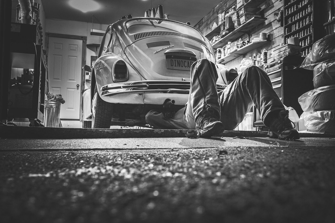 Well-organized professional auto repair shop interior with diagnostic equipment